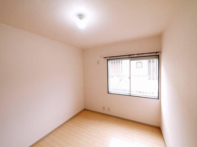 メゾン法蓮の洋室