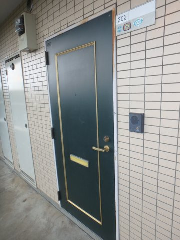 メゾンミルキーウェイの玄関|退去前なので、以前の写真です。