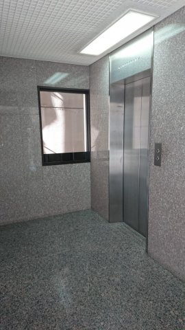 明友ビルのエントランス