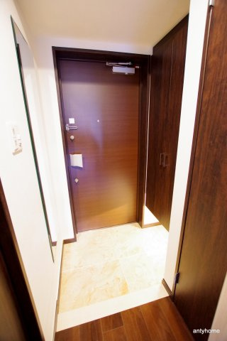 プレジオ江坂2　仲介手数料無料の玄関
