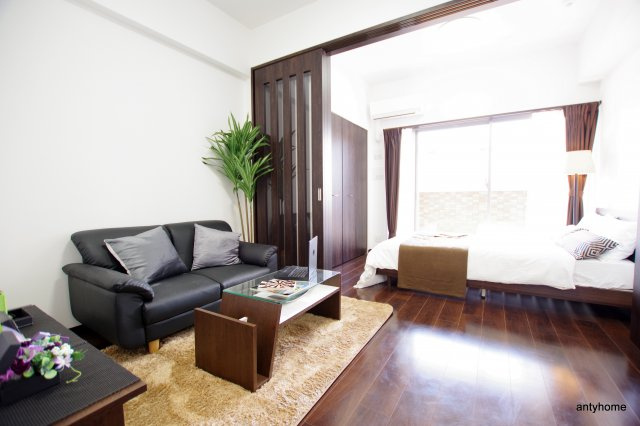 プレジオ江坂2　仲介手数料無料の居間・リビング