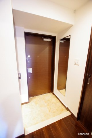 プレジオ江坂2　仲介手数料無料の玄関