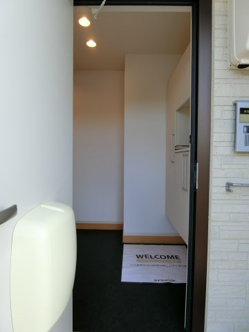 ブリリアントA棟の玄関