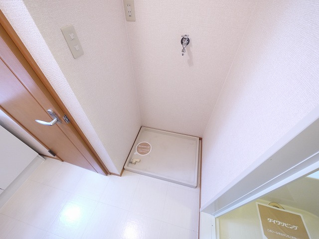 ロイヤルKの設備|室内洗濯置き場
