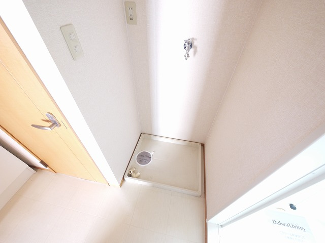 ロイヤルKの設備|室内洗濯置き場