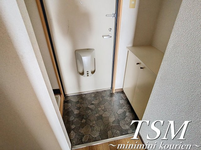 Ｍ’プラザ 香里五番館の玄関