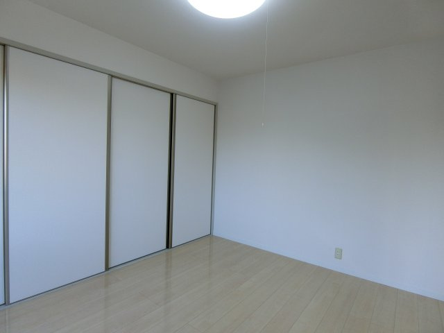 ラシェットエムザA棟の洋室