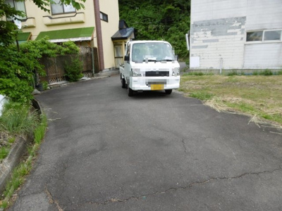 【前面道路含む現地写真】 | 黒石市ニ圧内温泉土地