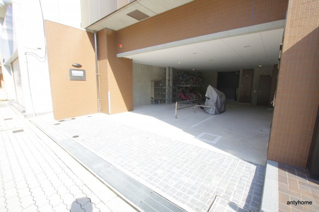 扇町公園プライマリーワン　仲介手数料無料の駐車場