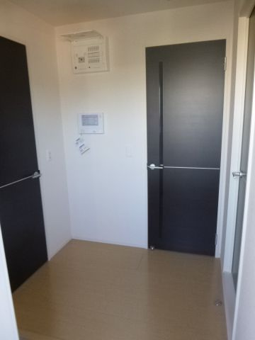 セジュール町坪の玄関