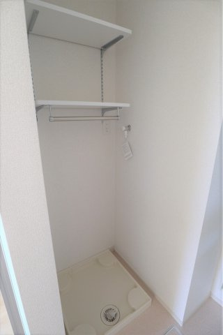 Ｍ’ｓ　ｇａｒｄｅｎ竹原中央Ⅰの洗面所|洗濯機置場