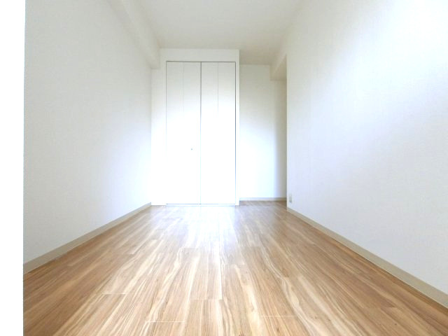 光明池アーバンライフの寝室