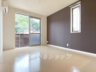 広島市安佐北区三入南１丁目のアパートの居間・リビング