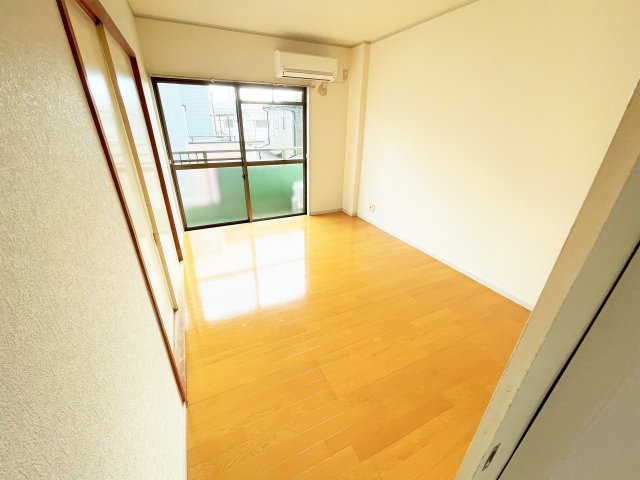 オレンジコート大網の洋室