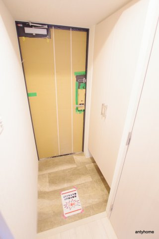エスリード九条スタシオン　仲介手数料無料の玄関