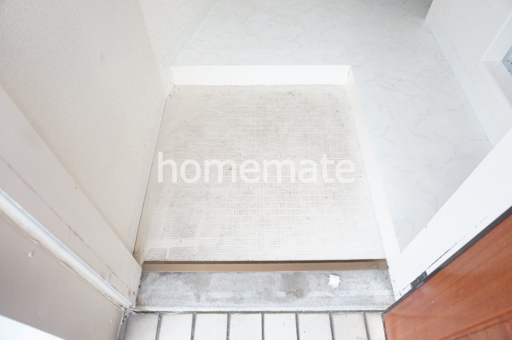 コーポリバーサイドの玄関