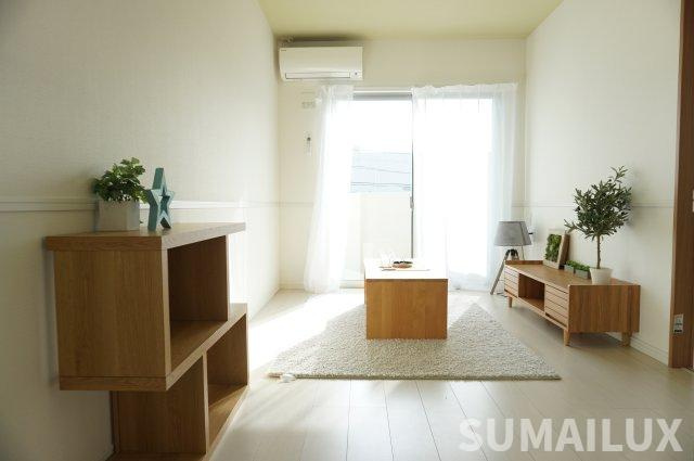 熊本市北区八景水谷１丁目の賃貸マンションの居間・リビング