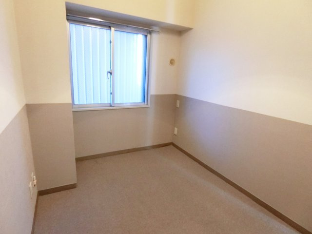 コスモ東金の洋室