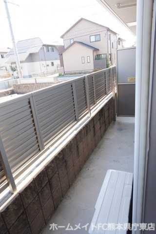 熊本市南区田井島３丁目のアパートのバルコニー