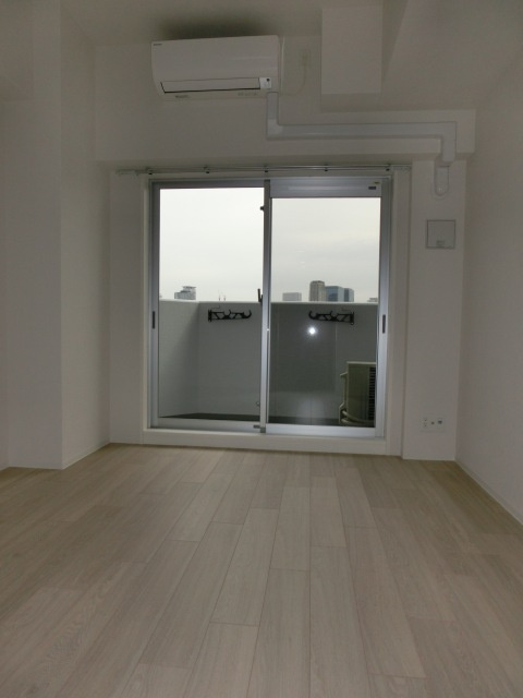 大阪市淀川区十三東１丁目の賃貸マンションの洋室
