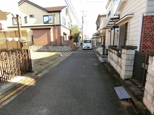 明石市藤が丘1丁目 土地の前面道路含む現地写真