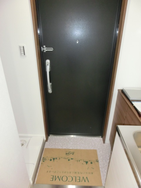 大阪市西淀川区歌島１丁目の賃貸マンションの玄関