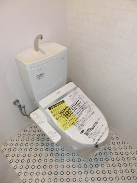 大阪市西淀川区歌島１丁目の賃貸マンションのトイレ