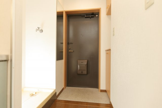 阿部松島マンションの玄関