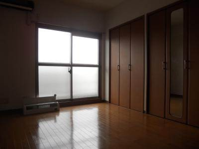 ヒーリングタワー七条大宮の寝室|洋室