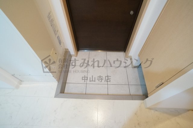 リーガルコート山本駅前の玄関
