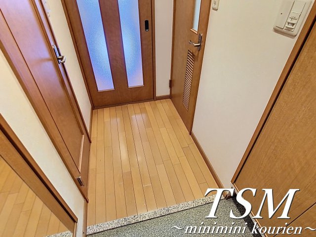 ロータリーマンション香里西之町の玄関