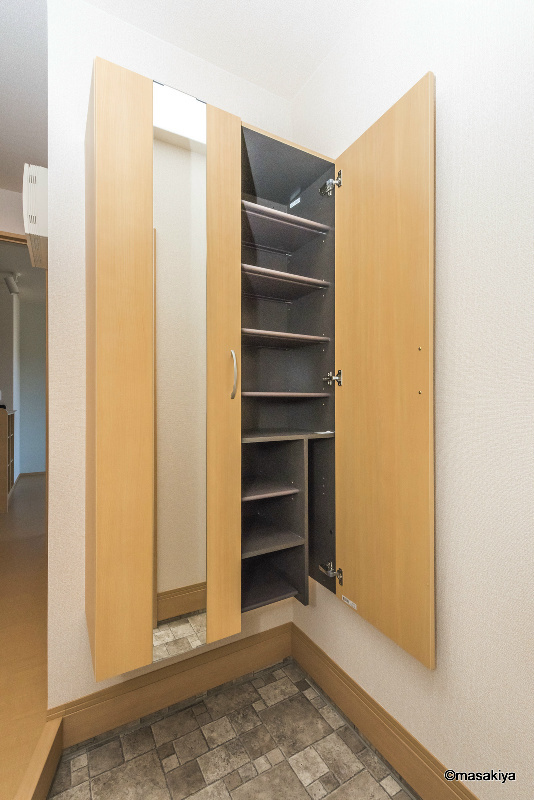 セジュール中越の玄関