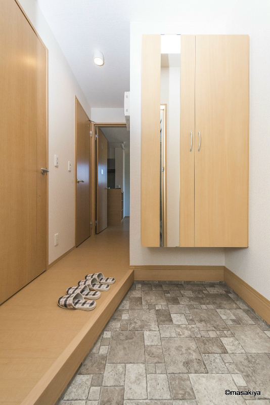 セジュール中越の玄関