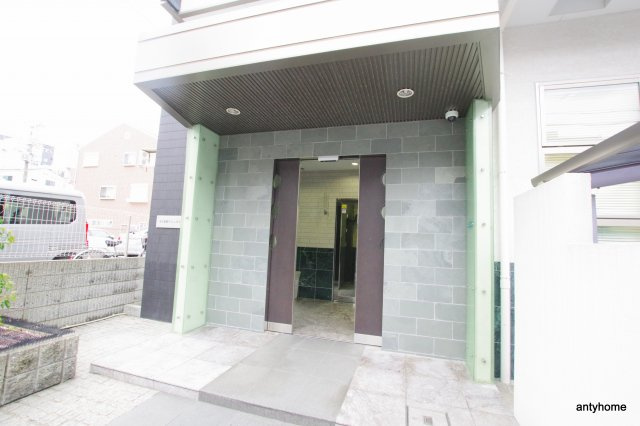 十三本町ウインズマンション2　仲介手数料無料のエントランス