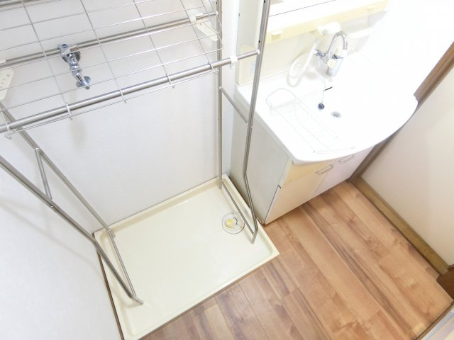 春日戸建の洗面所