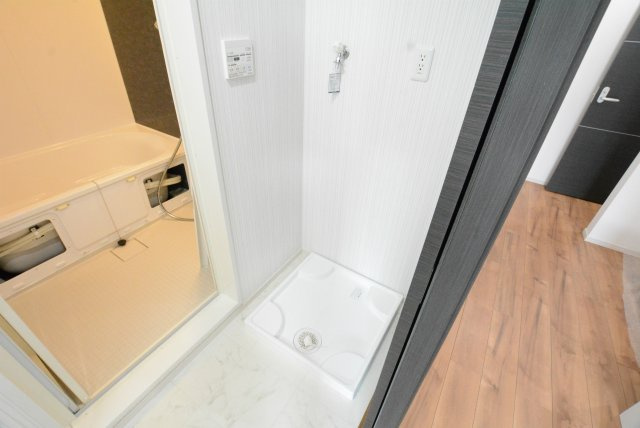 エクセラン朝妻の設備|コンパクトなランドリースペース