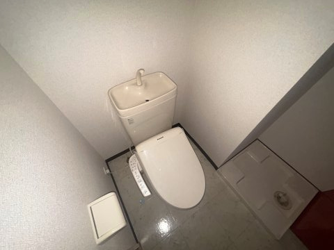 大阪市淀川区木川西４丁目の賃貸マンションのトイレ