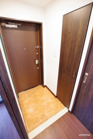 プレジオ十三　仲介手数料無料の玄関