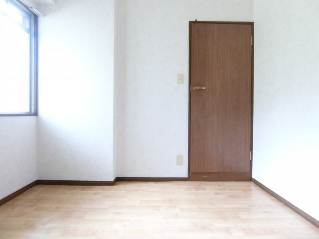 コンフォート津々山の寝室