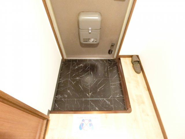 コンフォート津々山の玄関