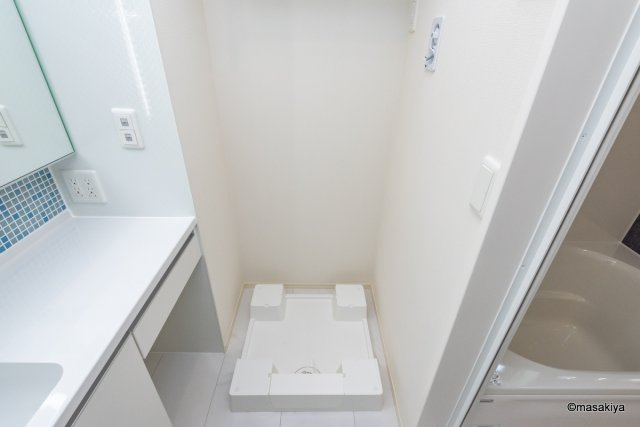 ライトグリーン鶴賀の洗面所|室内洗濯機置き場