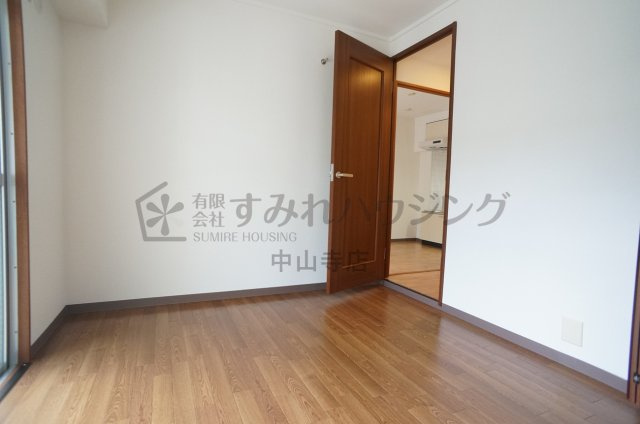 コンフィメゾン中山寺の寝室