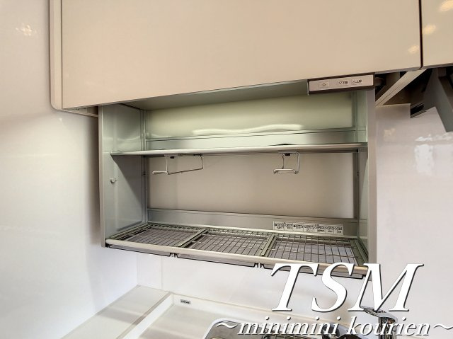 コーポ正宝　香里園のキッチン|昇降式のキッチンラック