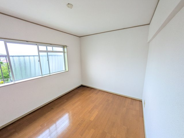 宿河原マンションの寝室
