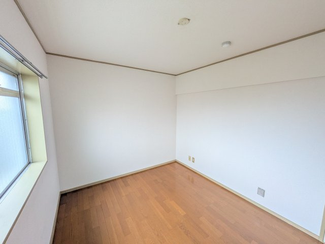 宿河原マンションの寝室