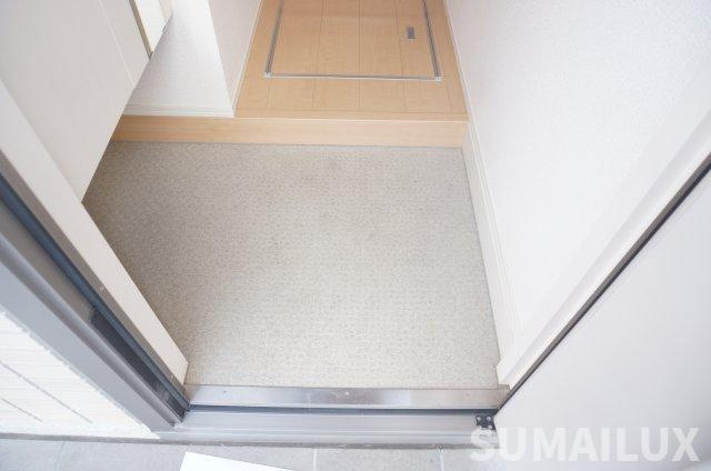 セジュール城東の玄関