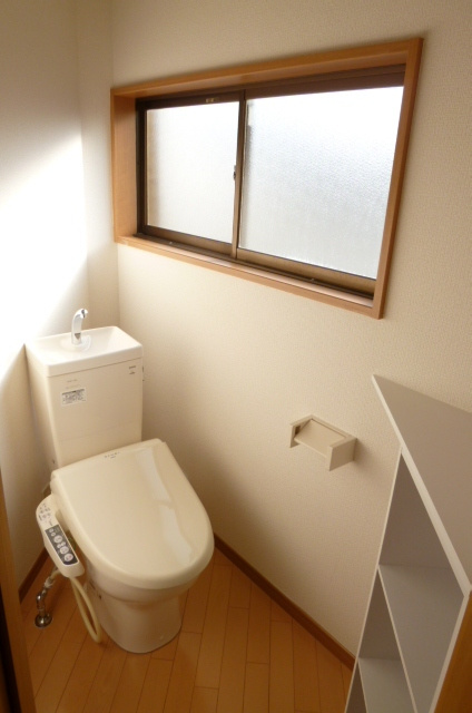 寿マンション【キャッシュバック対象物件】のトイレ|落ち着いた色調のトイレです