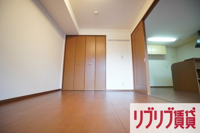 ロイヤルクレッセント西登戸の寝室