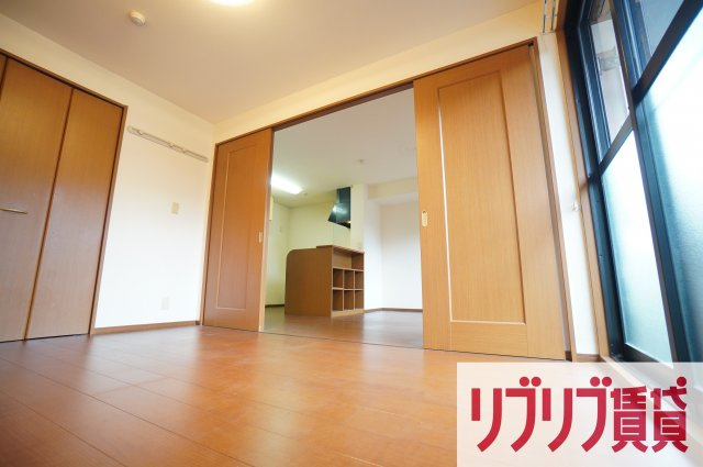 ロイヤルクレッセント西登戸の寝室