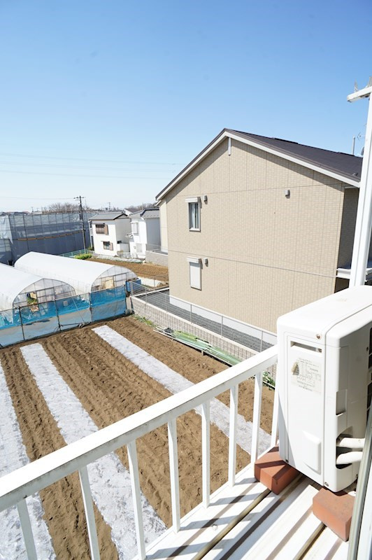 ハイムサンシャワーのバルコニー|バルコニーからの眺望、農地と住宅が広がる♪